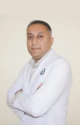 Dr. Kunjan Acharya کی تصویر